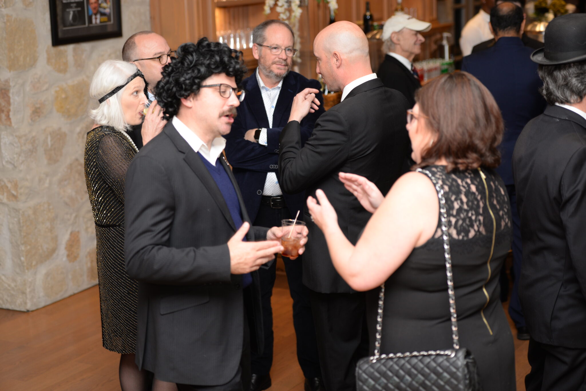Gathering of people talking with one another